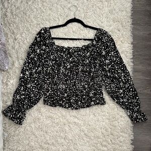 Elegant Black and White Smocked Blouse